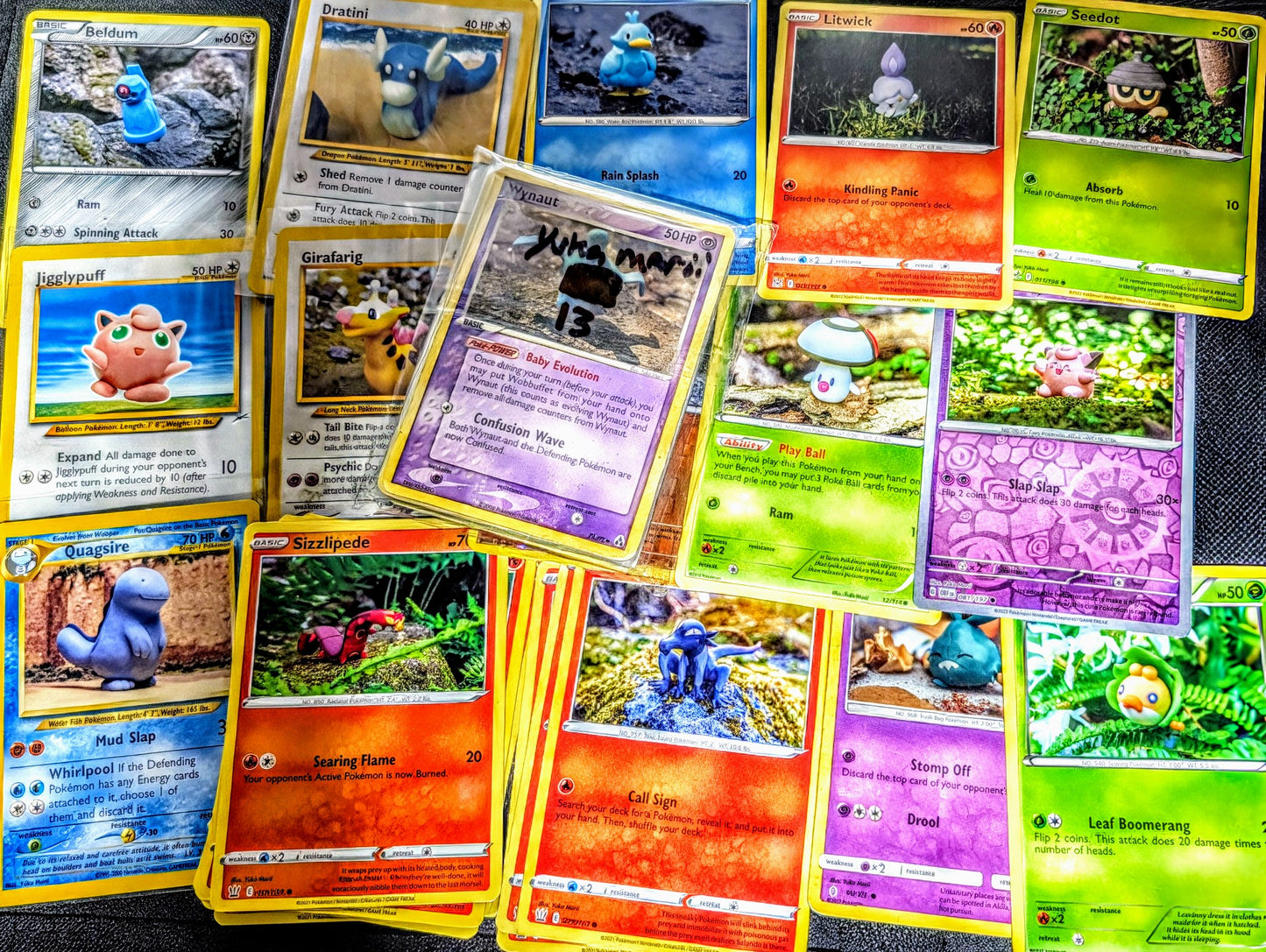 15 Yuka Morrii artwork Pokemon cards from various sets, some Rh, mostly c/uc.