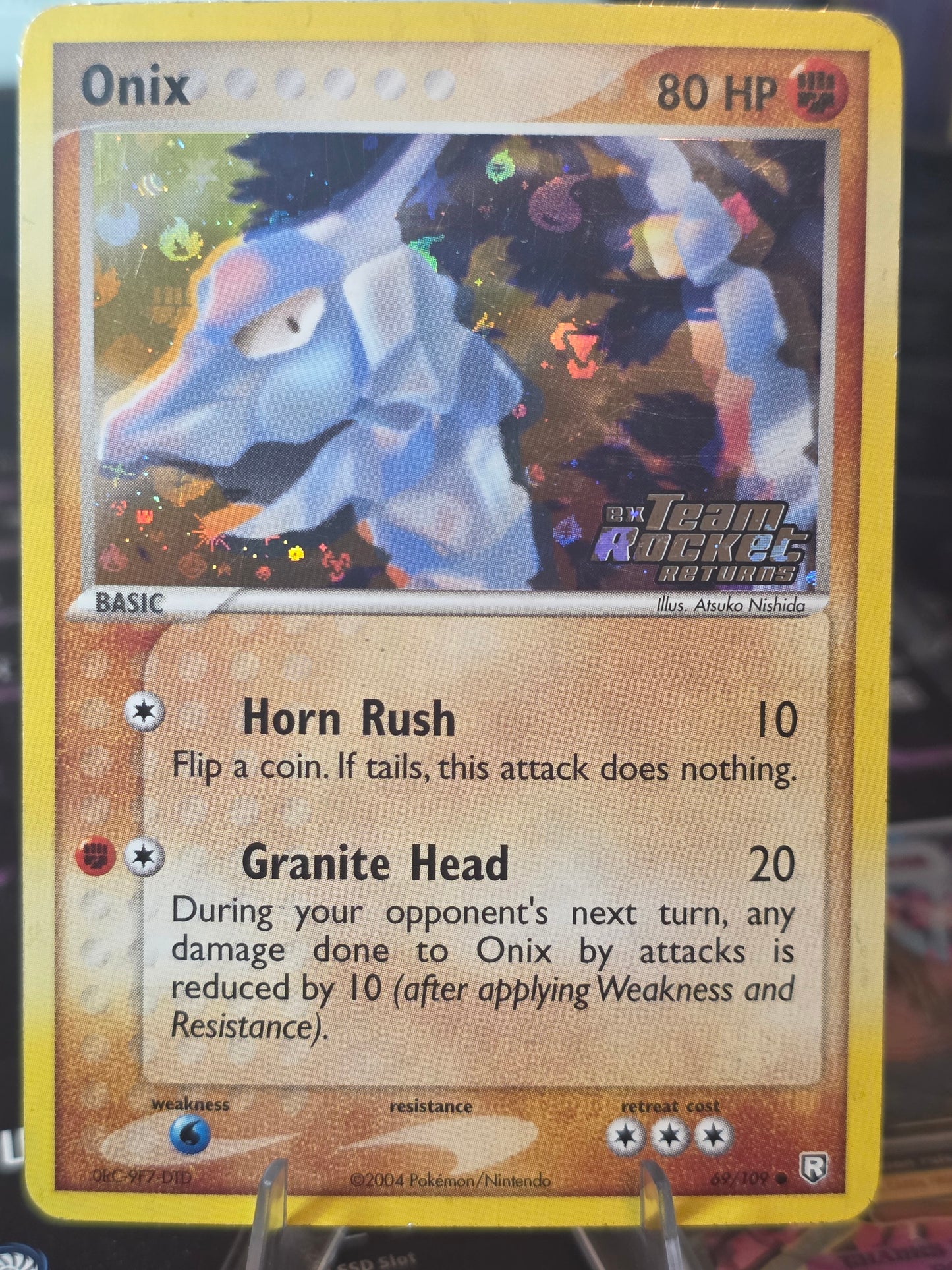 Onix 69/109 Common Reverse Holo Stamped Team Rocket Returns