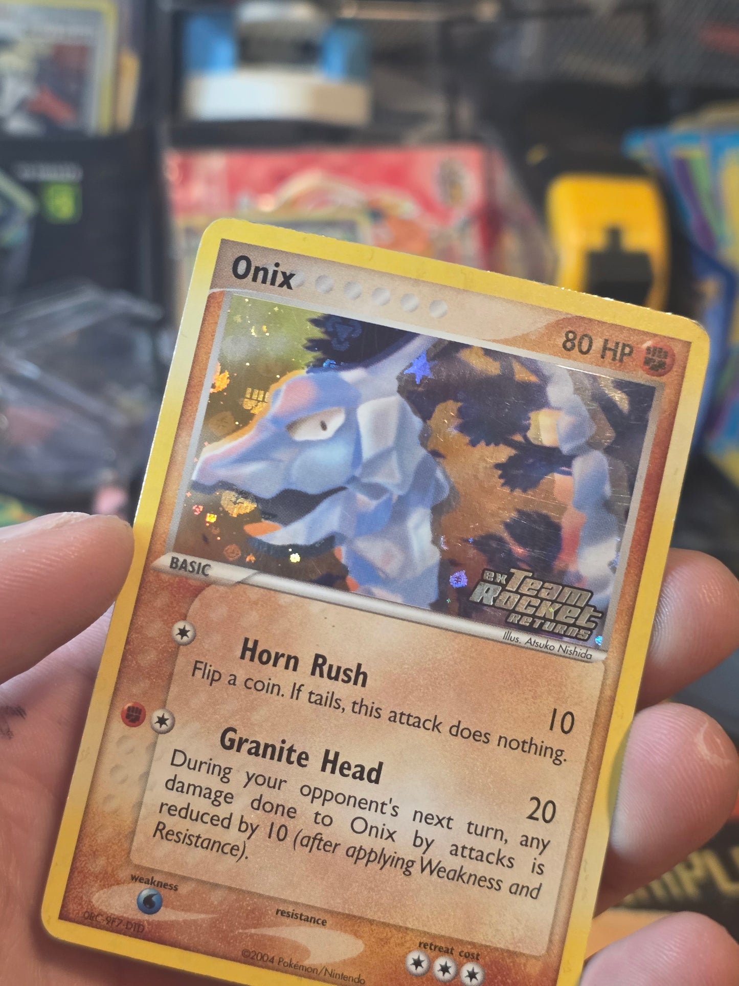 Onix 69/109 Common Reverse Holo Stamped Team Rocket Returns
