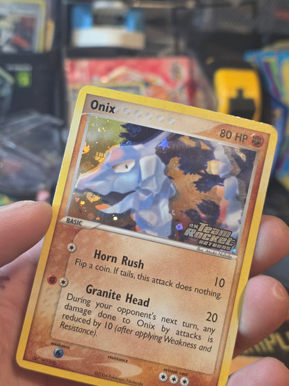 Onix 69/109 Common Reverse Holo Stamped Team Rocket Returns